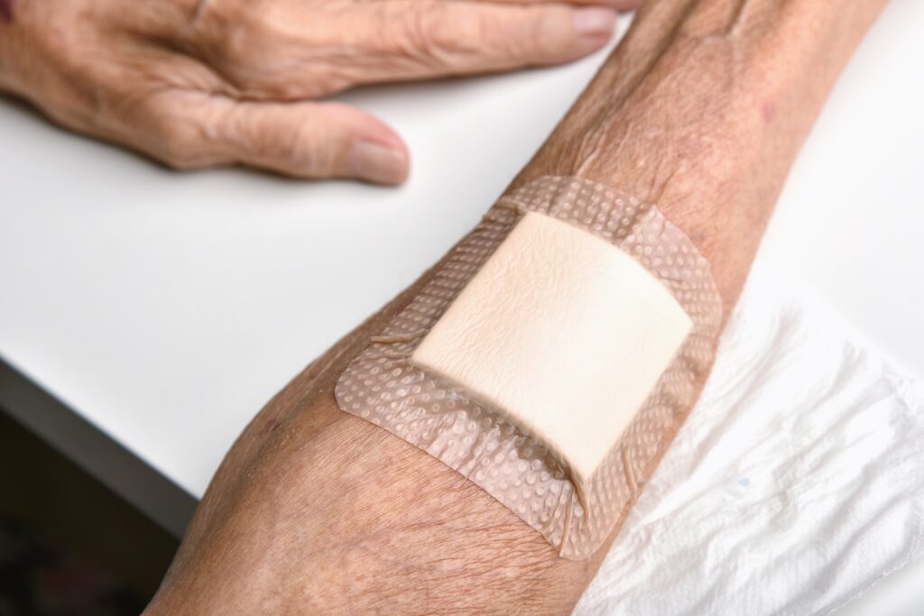 sign of diabetes - wounds slow to heal - elderly with wound on arm 