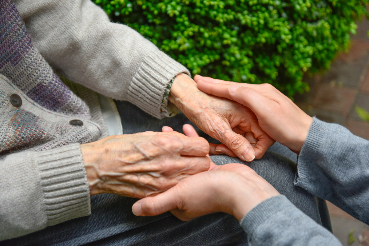 Homecare in Folkestone | carer being attentive to cleint
